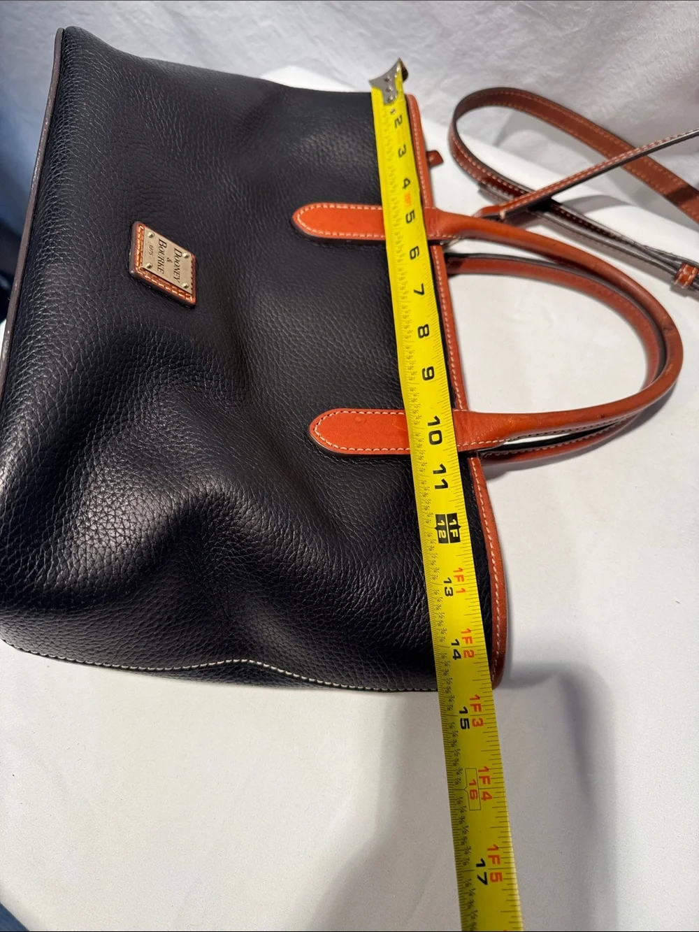 Dooney & Bourke Black Pebbled Leather Tote with Brown Trim & Handles